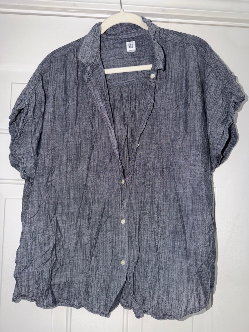 GAP Women's Short-Sleeve Button-Down Shirt in Charcoal Blue. Lightweight gauzy